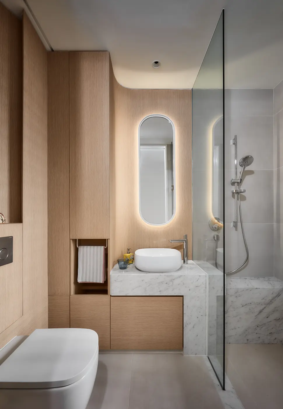 Bathroom with marble and light timber