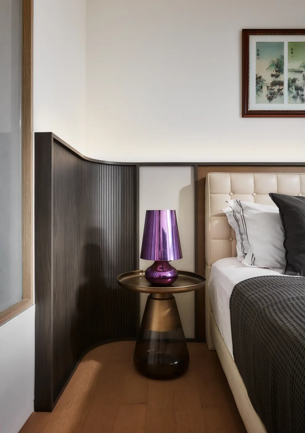 Bedside detail — Ferruccio Laviani Bourgie lamp and curved panel
