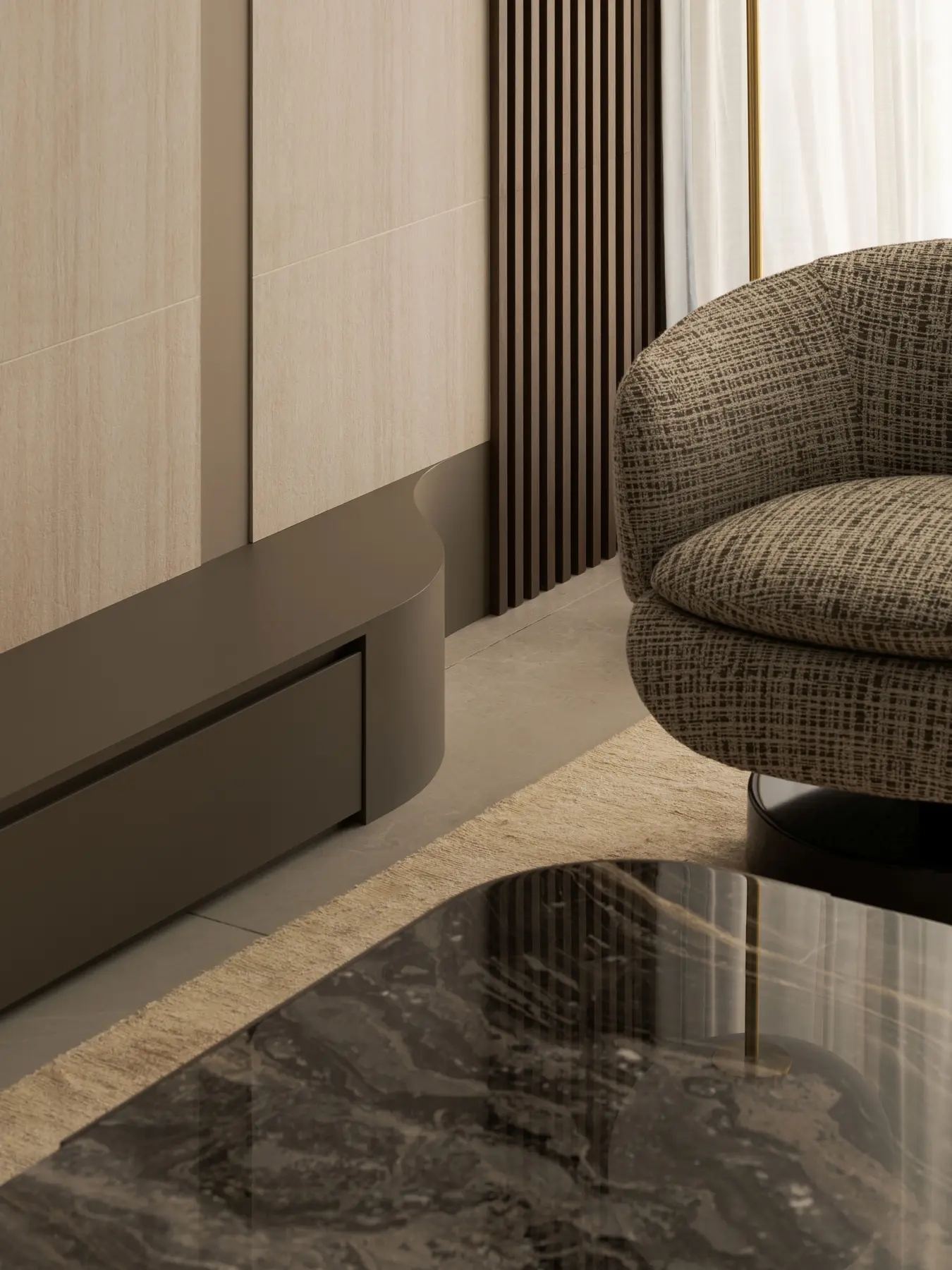 Living room detail — sofa base, dark marble table edge, boucle armchair and marble floor